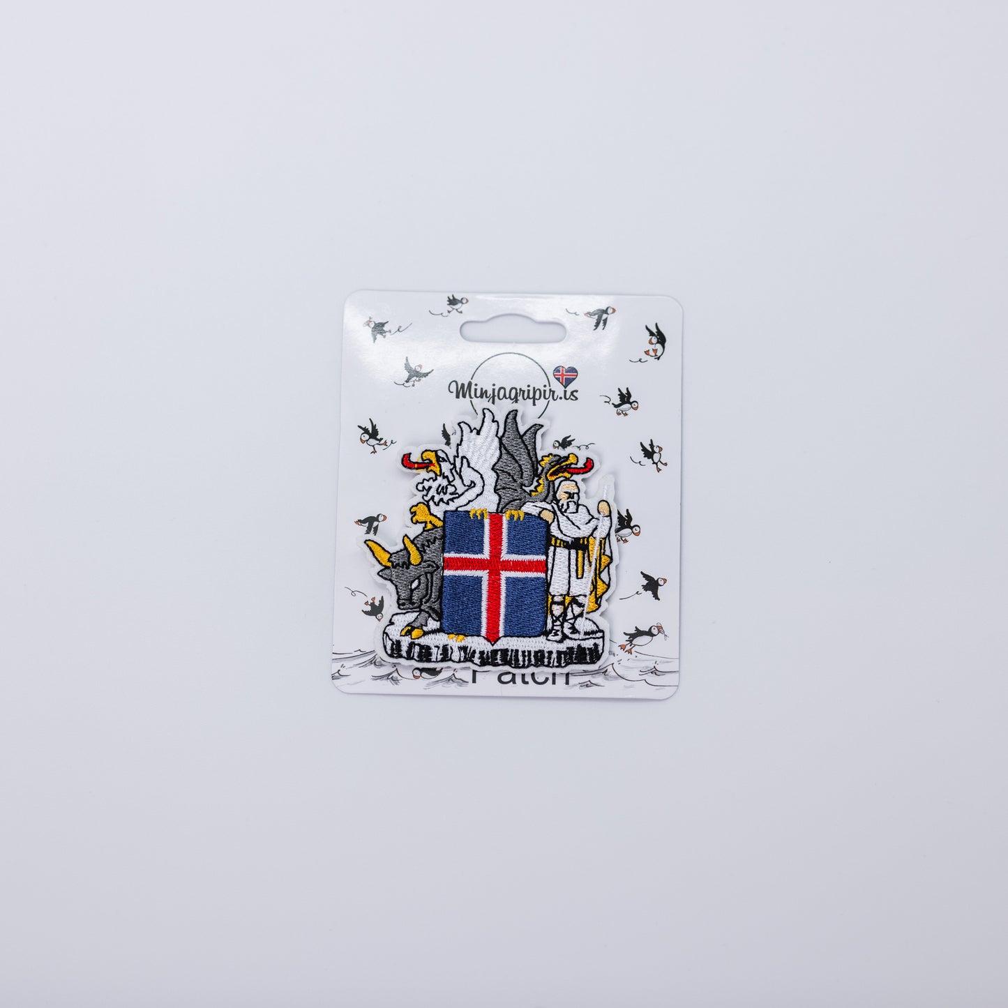 Ofinn miði - Skjaldarmerki